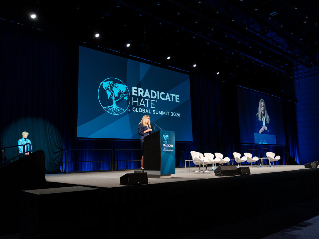 Brette Steele speaks on the main state at the 2026 Eradicate Hate Summit
